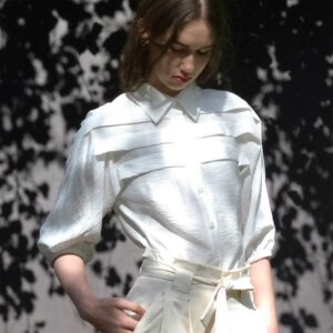 Raili Nõlvak Volditud rinnaga Valge pluus